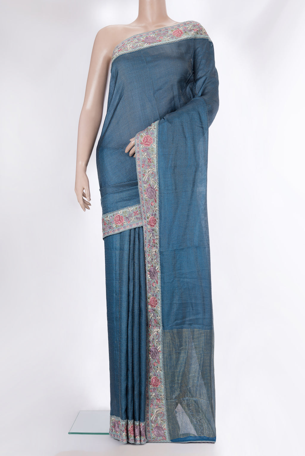 Pure Silk Peacock Blue Dual Tone Tussar Saree with Checked design on the body and Embroidery Border.  displayed on a mannequin