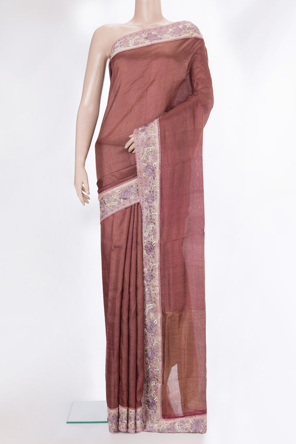 Brown Tussar Saree with Checked design on the body and Embroidery Border.  displayed on a mannequin