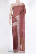 Brown Tussar Saree with Checked design on the body and Embroidery Border.  displayed on a mannequin