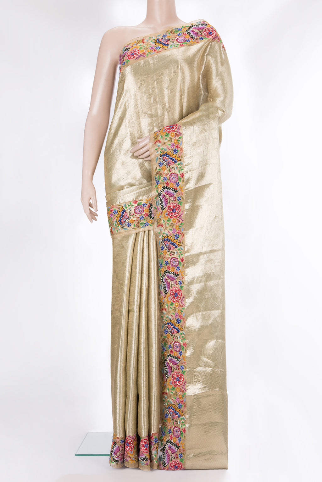 Gold Dual Tone Banarasi Tissue Saree with Zari Brocade on the body and Embroidery Border.  displayed on a mannequin