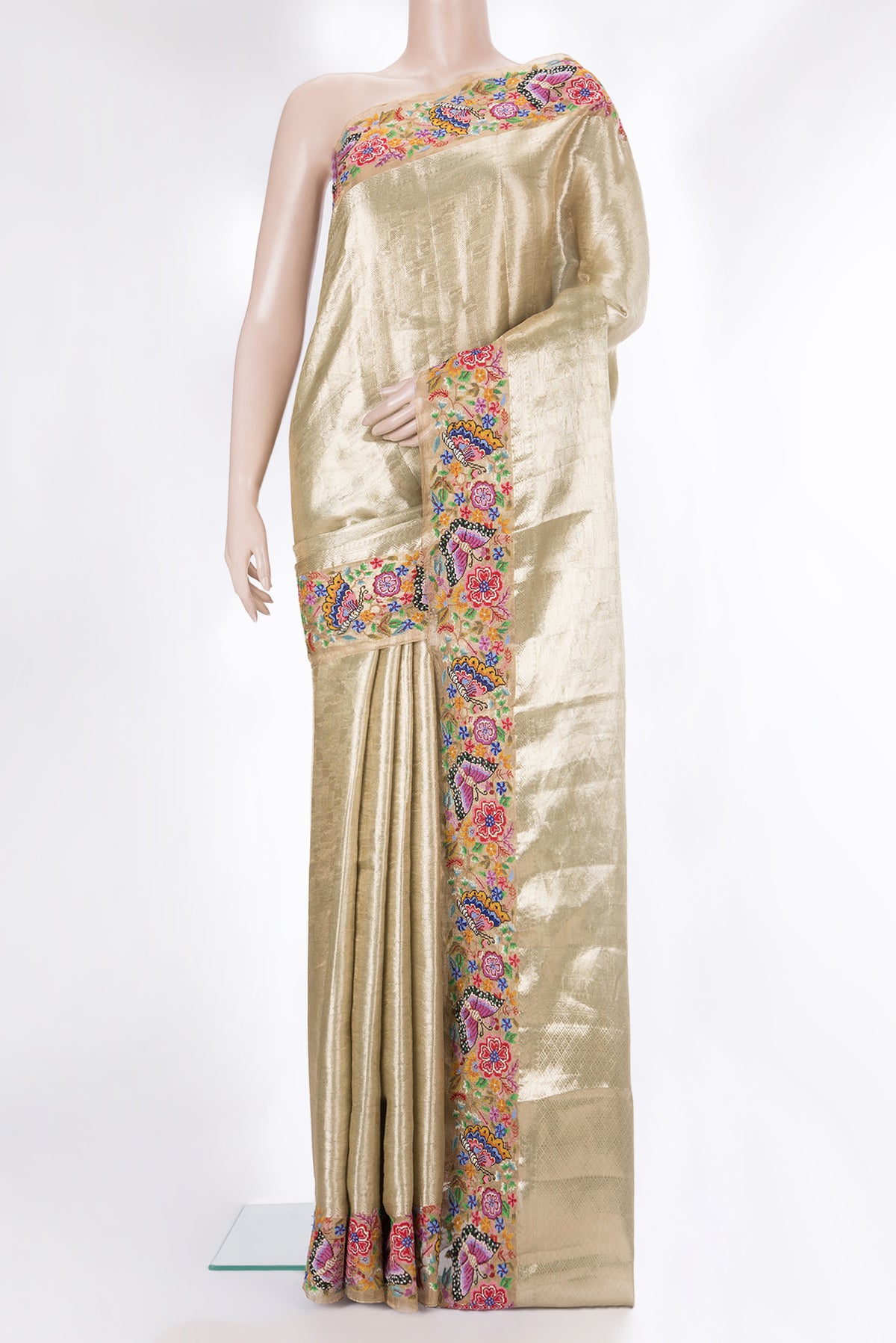 Gold Dual Tone Banarasi Tissue Saree with Zari Brocade on the body and Embroidery Border.  displayed on a mannequin