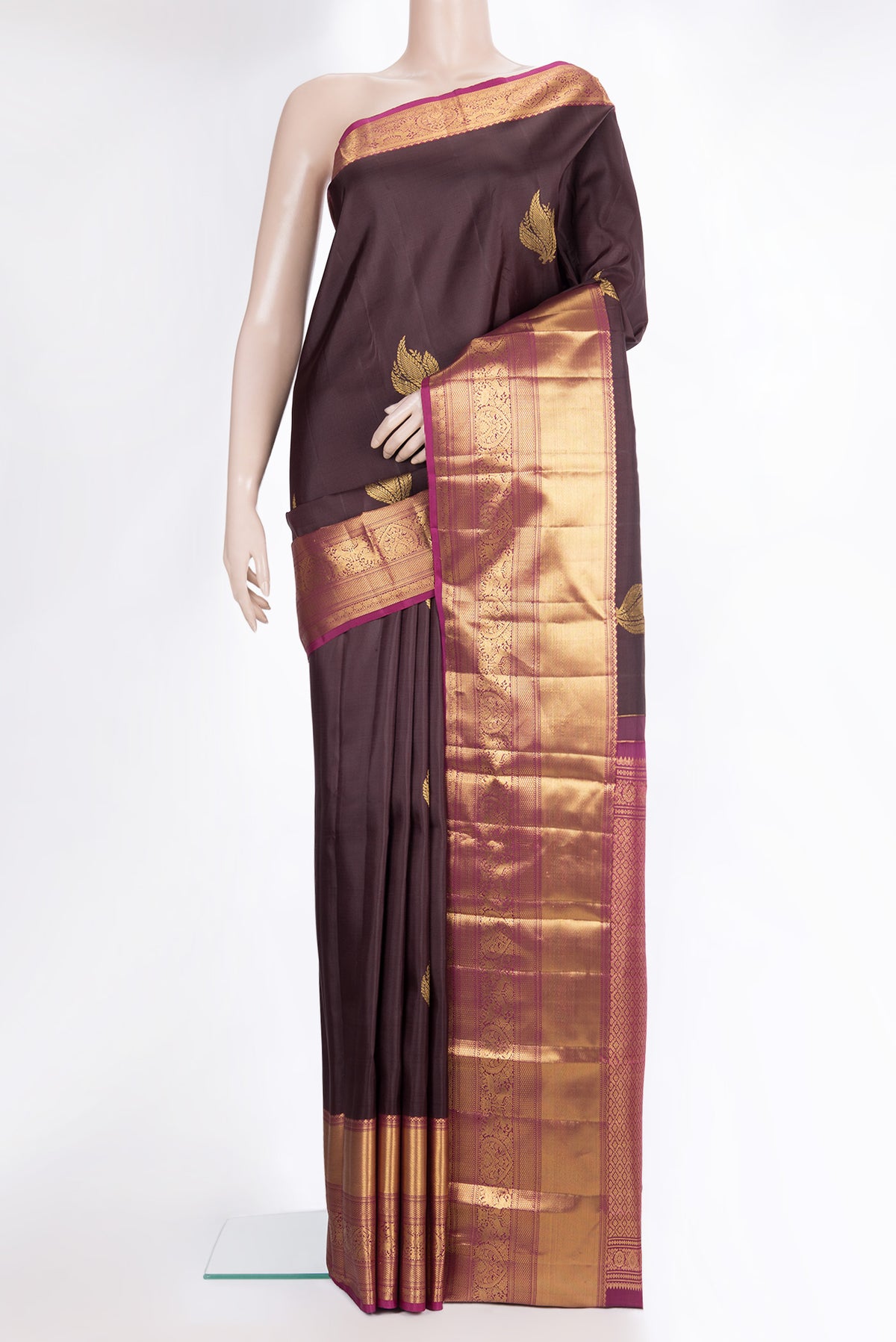 Pure Silk Coffee Brown Kanchipuram Saree with Zari Butta on the body and Fancy Border.  displayed on a mannequin