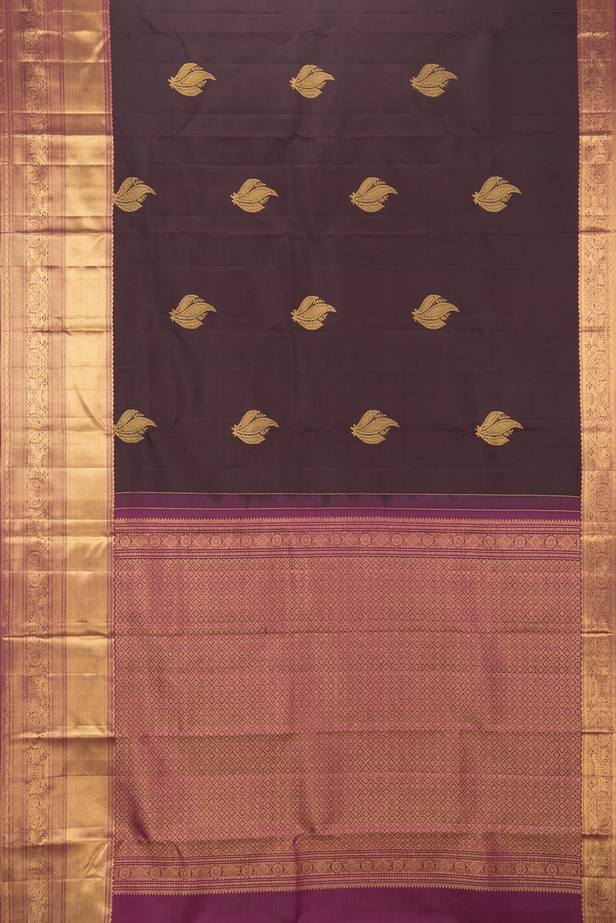 Flat view of Pure Silk Coffee Brown Kanchipuram Saree with Zari Butta on the body and Fancy Border. 