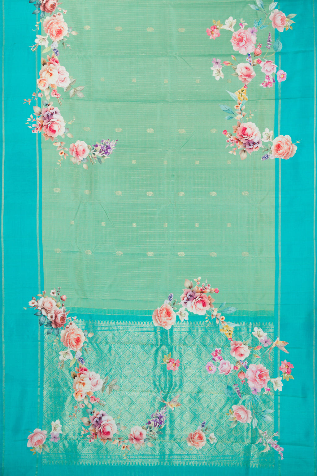 Flat view of Pure Silk Sea Green Kanchipuram Saree with Zari Butta on the body and Fancy Border. 