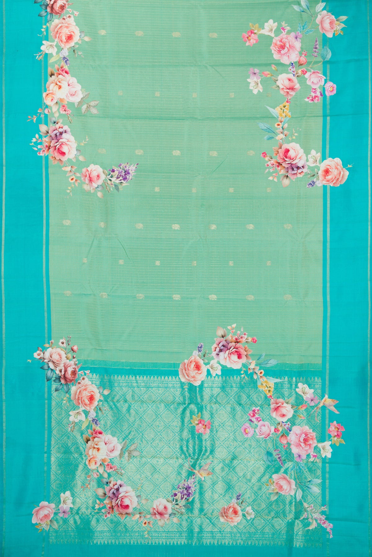 Flat view of Pure Silk Sea Green Kanchipuram Saree with Zari Butta on the body and Fancy Border. 