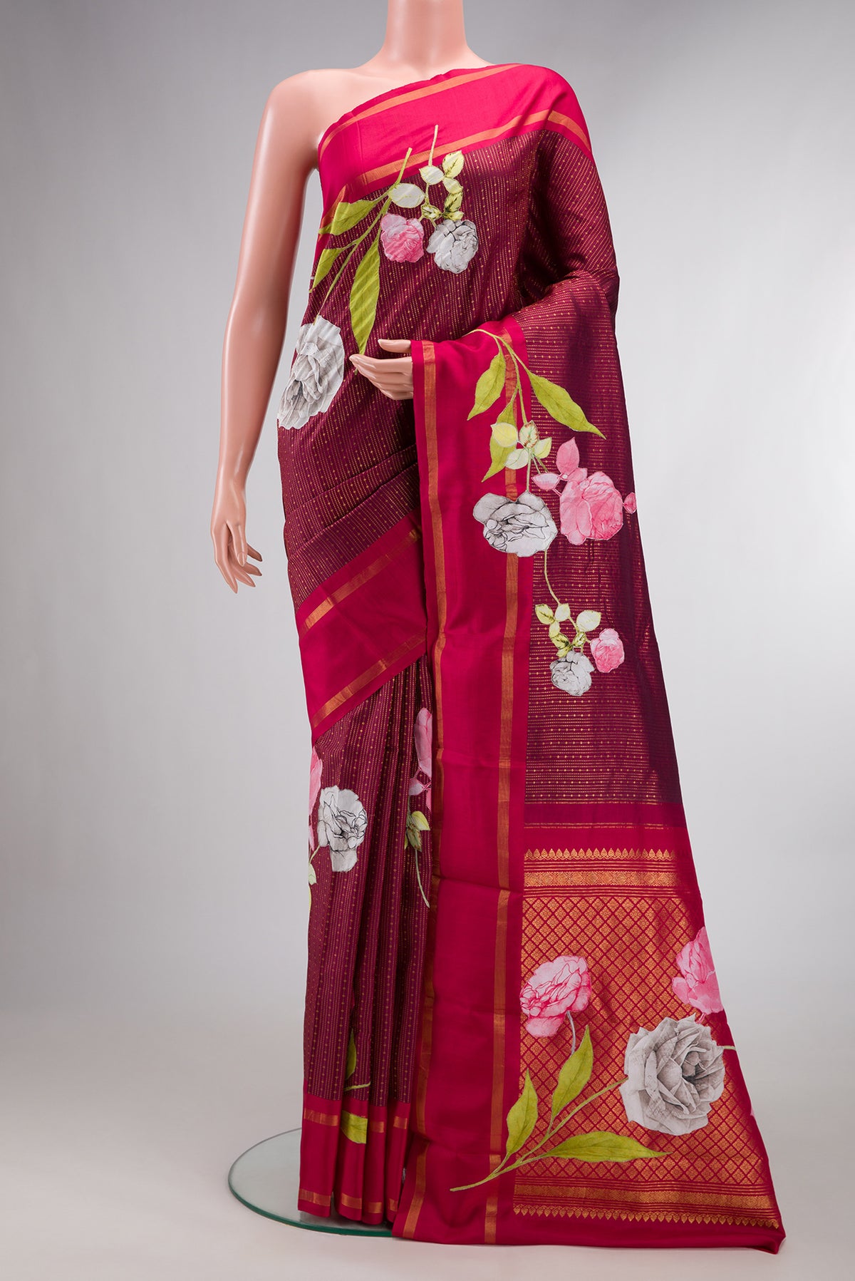 Pure Silk Maroon Kanchipuram Saree with Stripes on the body and Fancy Border.  displayed on a mannequin