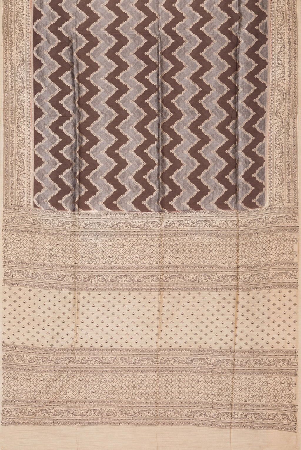 Flat view of Brown Dual Tone Tussar Saree with Zari Brocade on the body and Embroidery Border. 