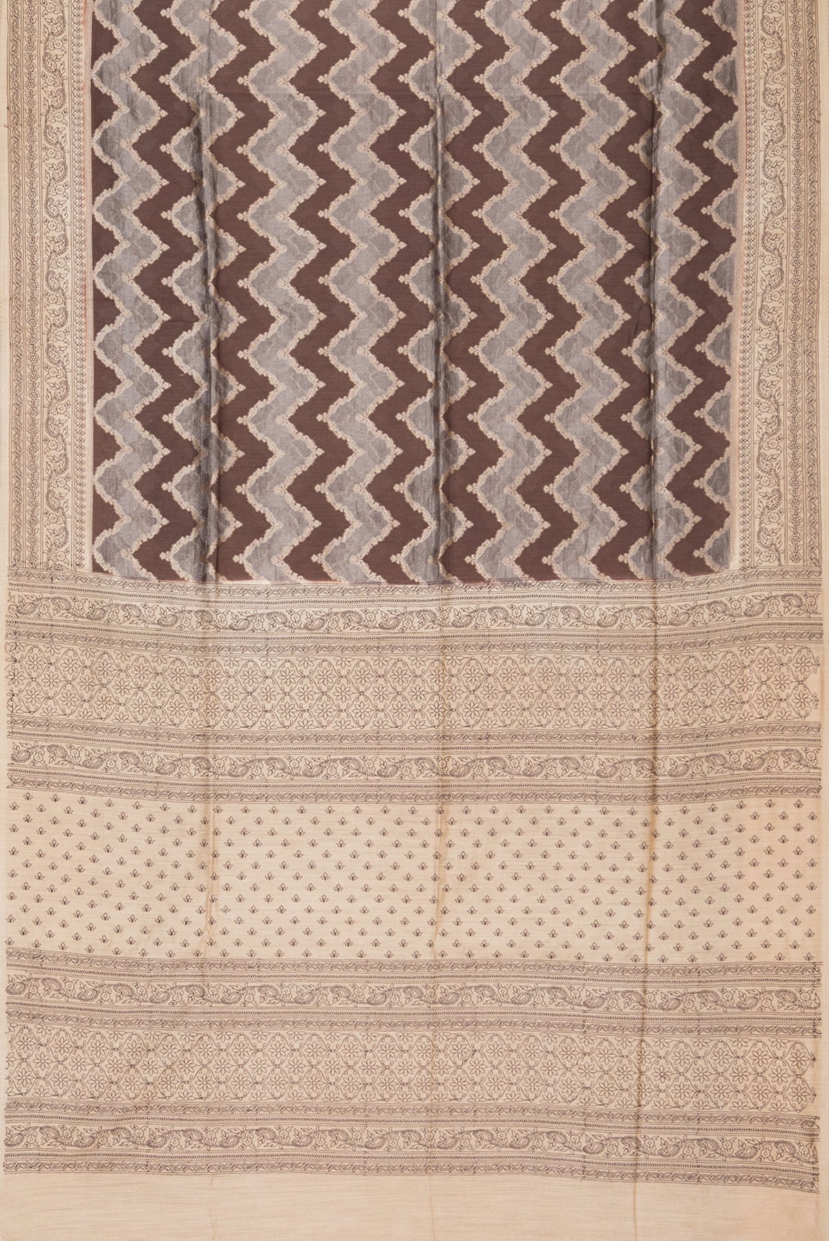 Flat view of Brown Dual Tone Tussar Saree with Zari Brocade on the body and Embroidery Border. 