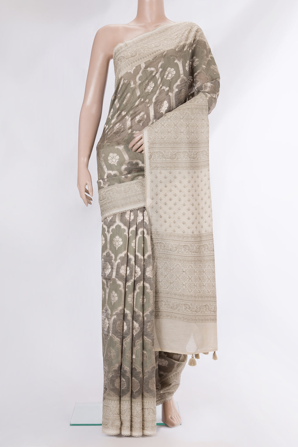 Pure Silk Grey Dual Tone Tussar Saree with Zari Brocade on the body and Embroidery Border.  displayed on a mannequin
