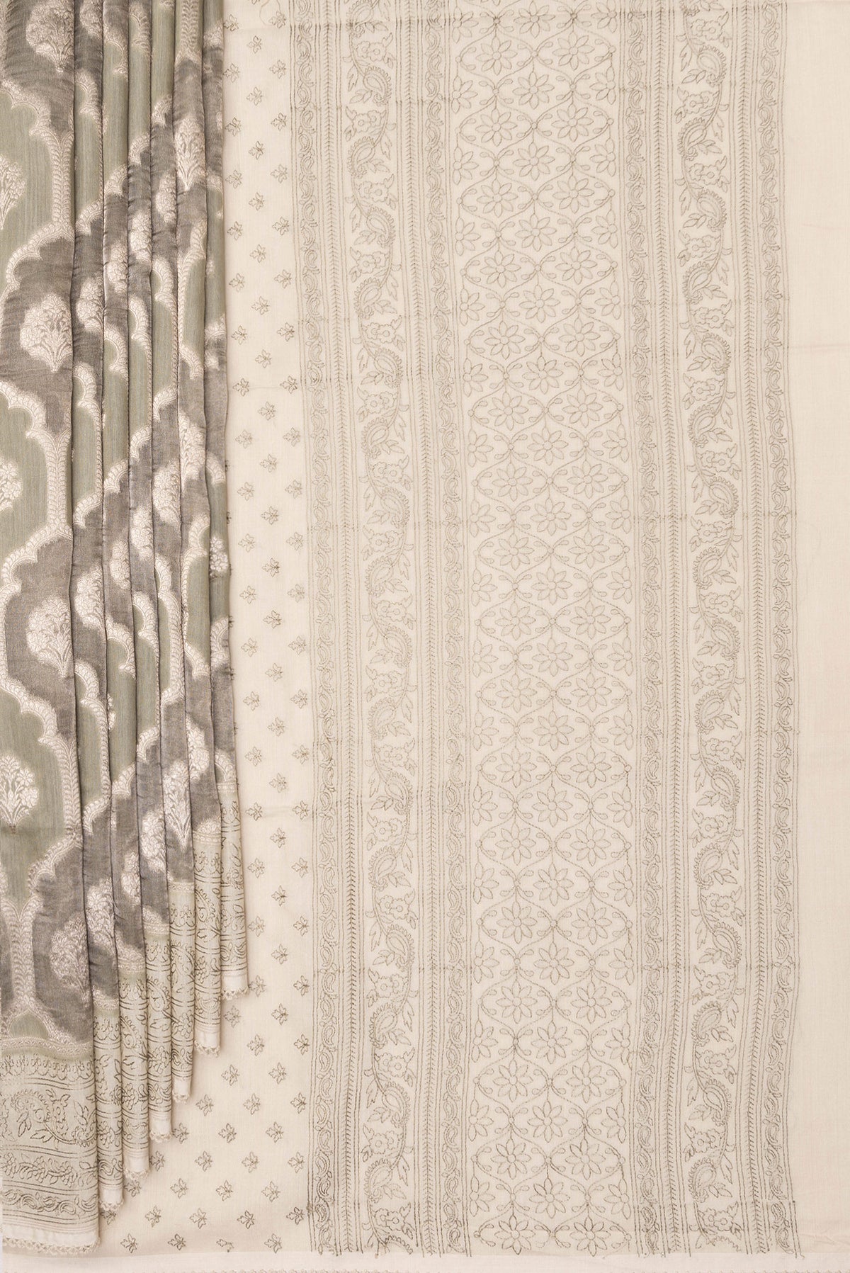 Pleats and pallu of Pure Silk Grey Dual Tone Tussar Saree with Zari Brocade on the body and Embroidery Border. 