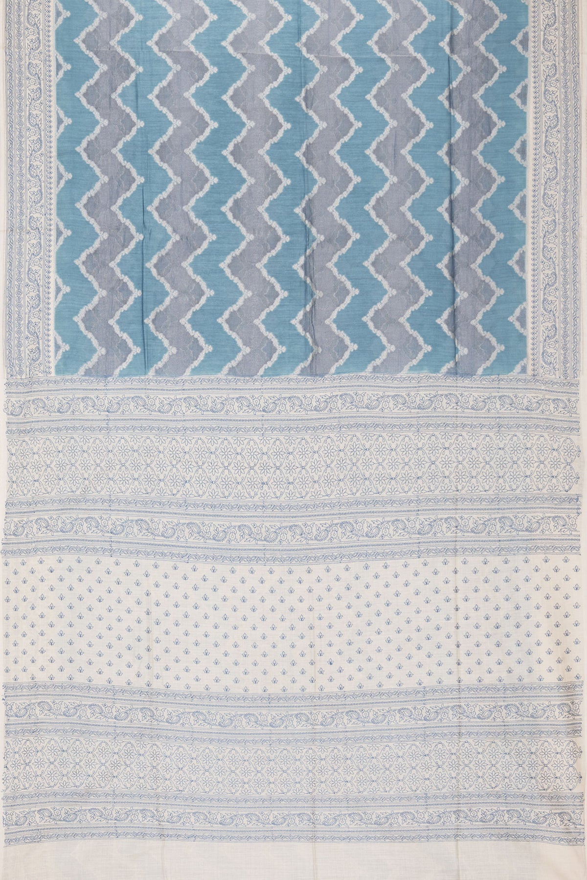 Flat view of Light Blue Dual Tone Tussar Saree with Zari Brocade on the body and Embroidery Border. 
