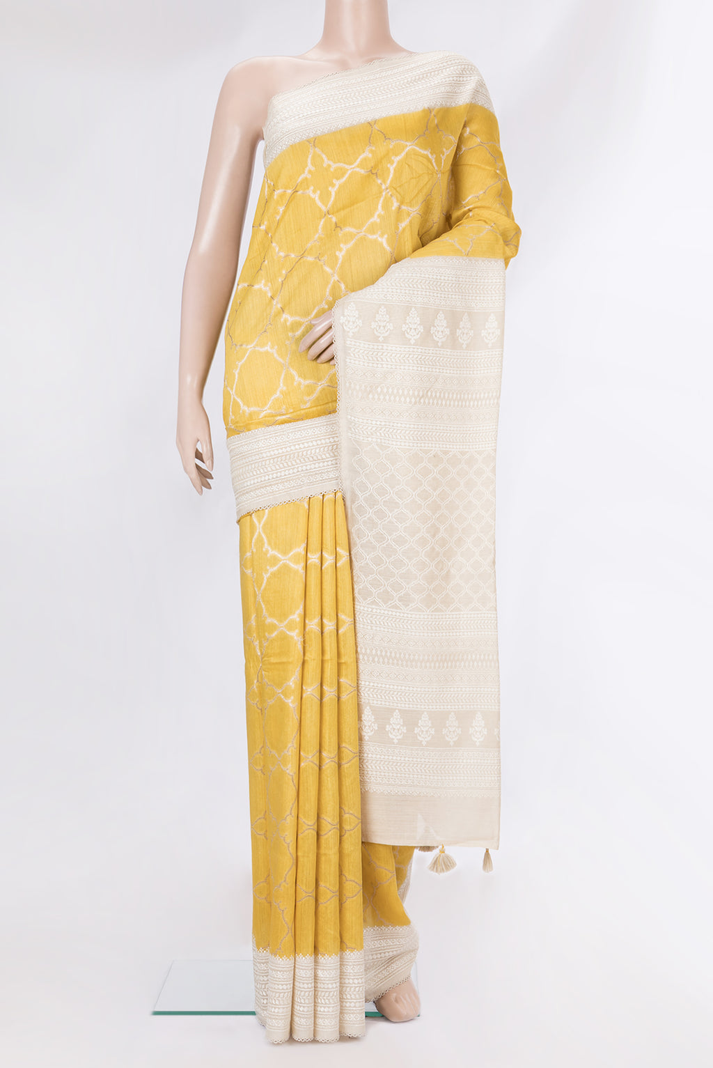 Pure Silk Yellow Dual Tone Tussar Saree with Zari Brocade on the body and Embroidery Border.  displayed on a mannequin