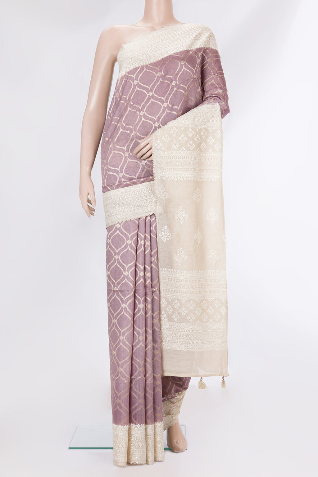 Pure Silk Lavender Dual Tone Tussar Saree with Zari Brocade on the body and Embroidery Border.  displayed on a mannequin