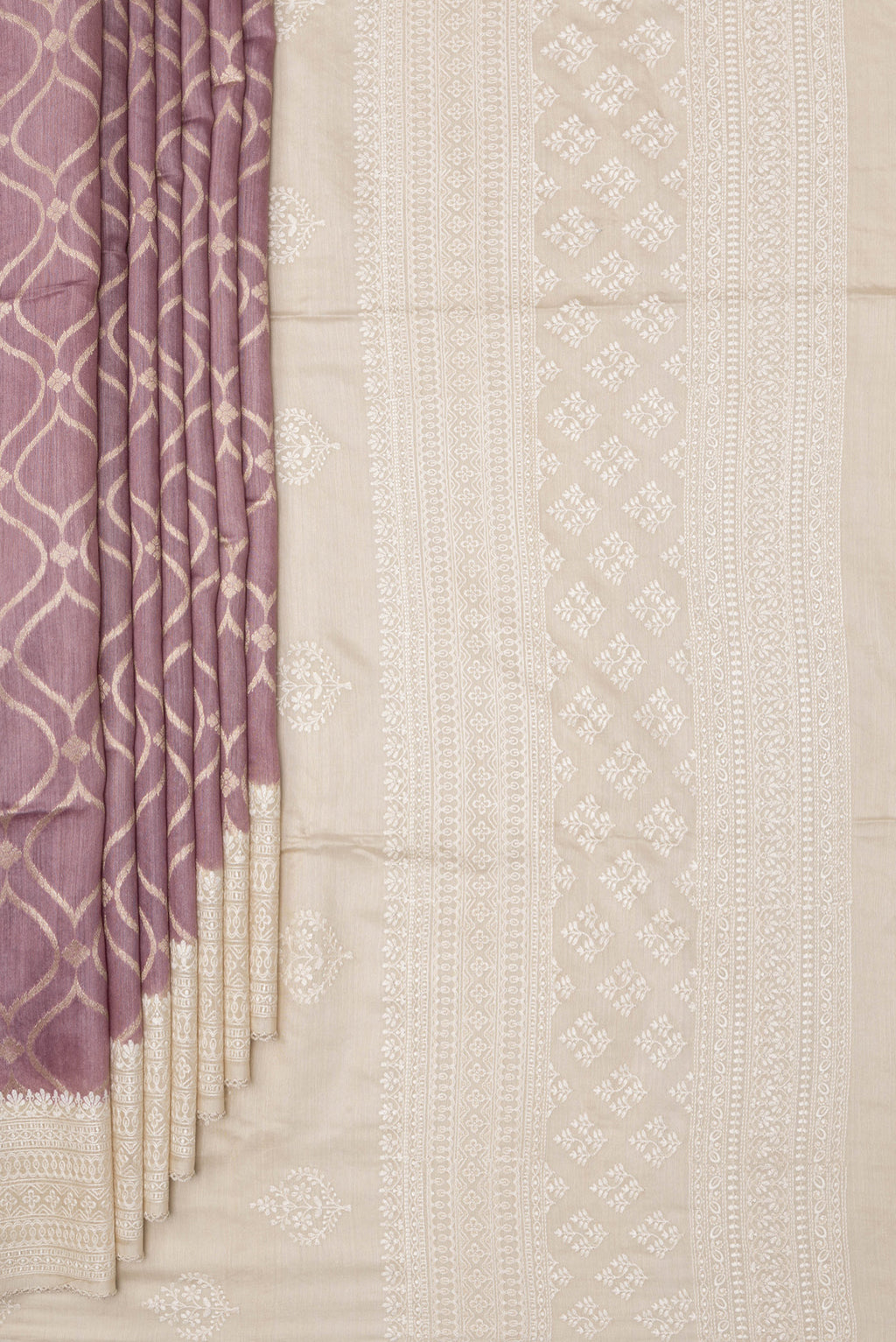 Pleats and pallu of Pure Silk Lavender Dual Tone Tussar Saree with Zari Brocade on the body and Embroidery Border. 