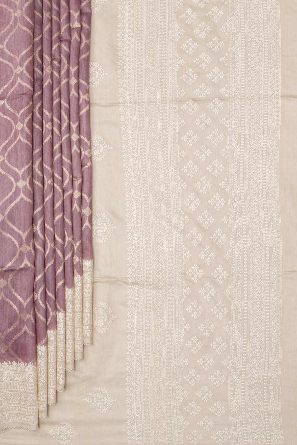 Pleats and pallu of Pure Silk Lavender Dual Tone Tussar Saree with Zari Brocade on the body and Embroidery Border. 