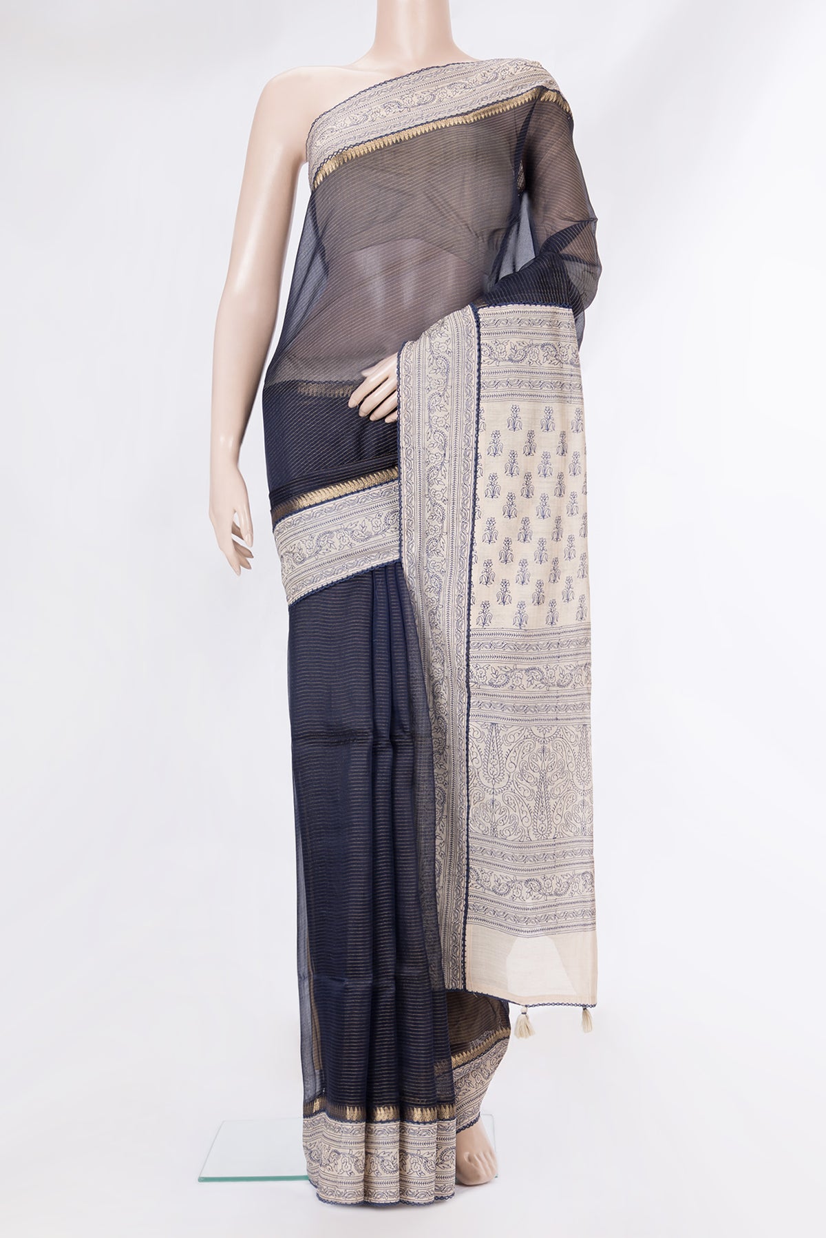 Pure Silk Navy Blue Dual Tone Tussar Saree with Stripes on the body and Embroidery Border.  displayed on a mannequin