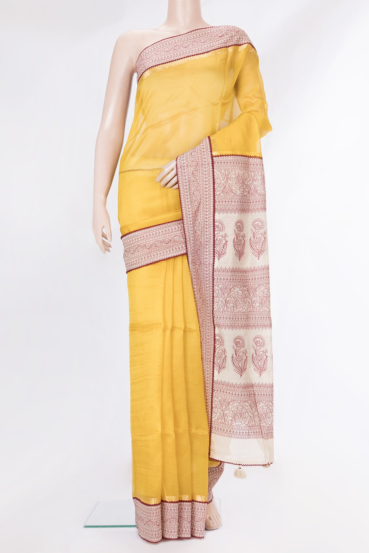 Pure Silk Yellow Dual Tone Tussar Saree with Stripes on the body and Embroidery Border.  displayed on a mannequin