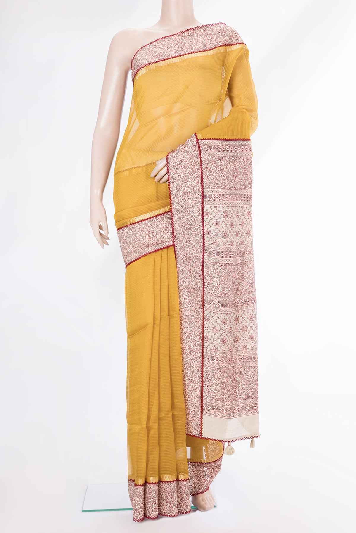 Yellow Tussar Saree with Stripes on the body and Embroidery Border.  displayed on a mannequin