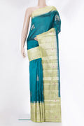 Pure Silk Peacock Blue Dual Tone Tussar Saree with Zari Butta on the body and Fancy Border.  displayed on a mannequin