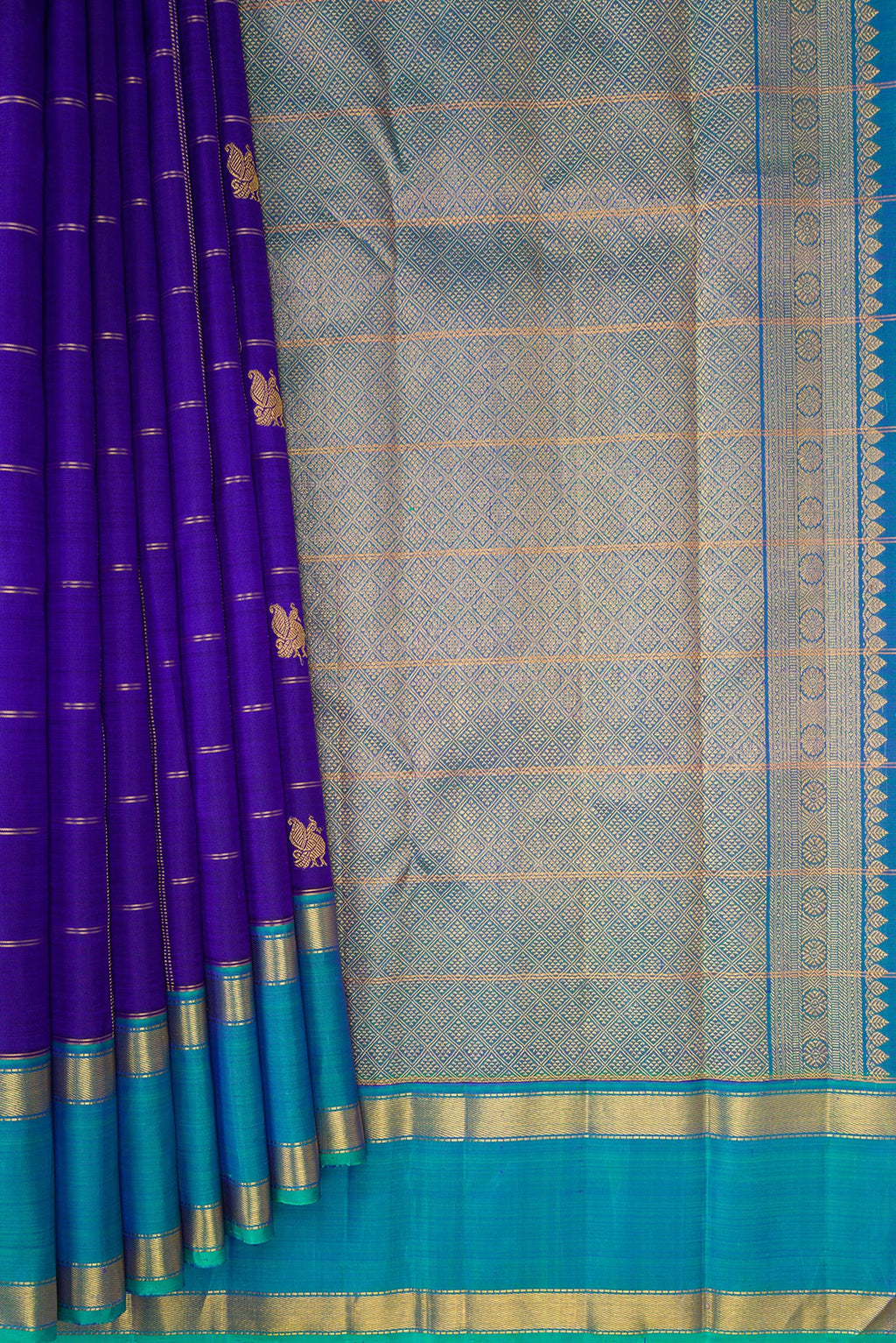 Pleats and pallu of Pure Silk Dark Blue Kanjivaram Saree with Checked design on the body and Zari Border. 