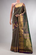 Pure Silk Green with Violet Color Kanchipuram Saree with Zari Brocade on the body and Zari Border.  displayed on a mannequin