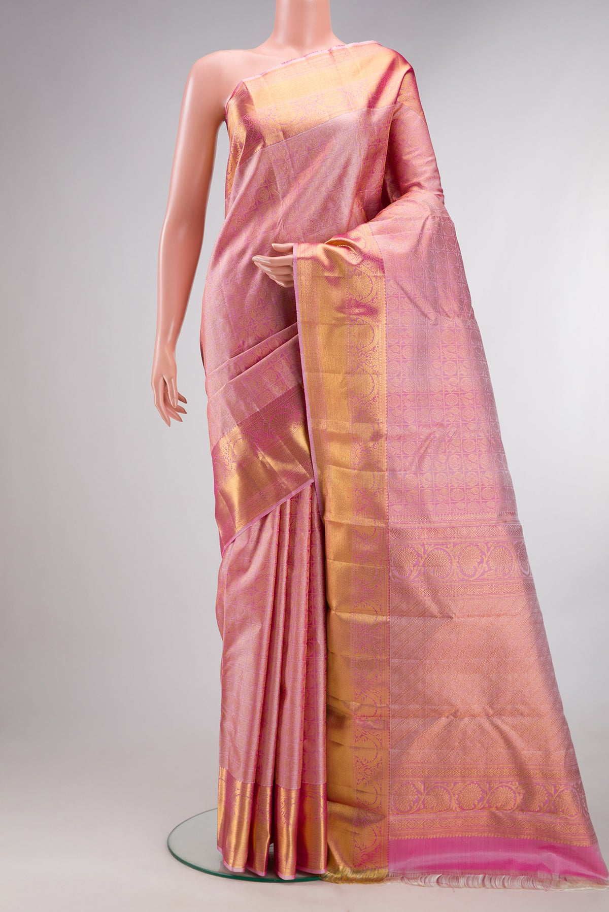 Pure Silk Pink Dual Tone Kanchipuram Saree with Zari Brocade on the body and Zari Border.  displayed on a mannequin