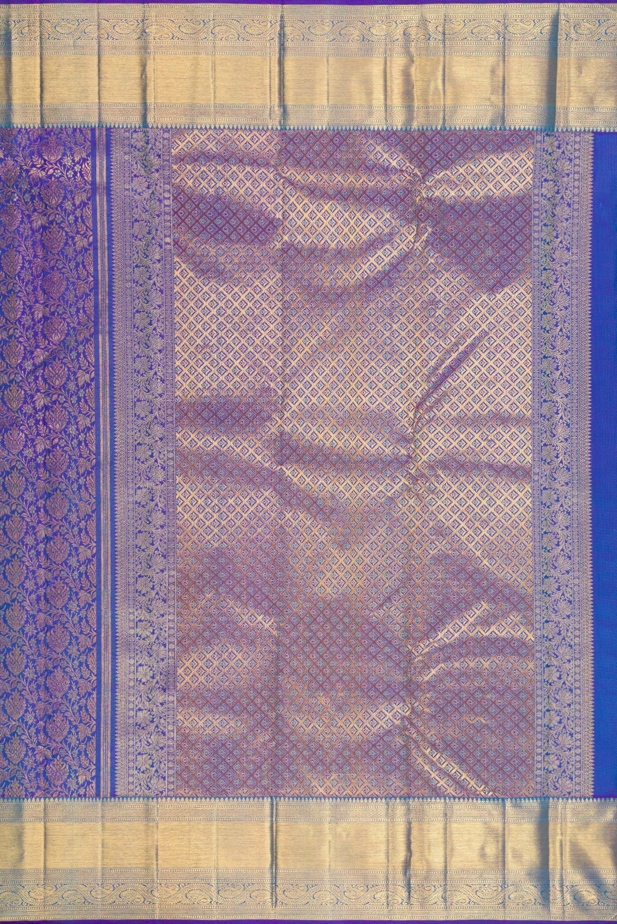 Close up image of the pallu of Pure Silk Royal Blue Dual Tone Kanchipuram Saree with Zari Brocade on the body and Zari Border. 