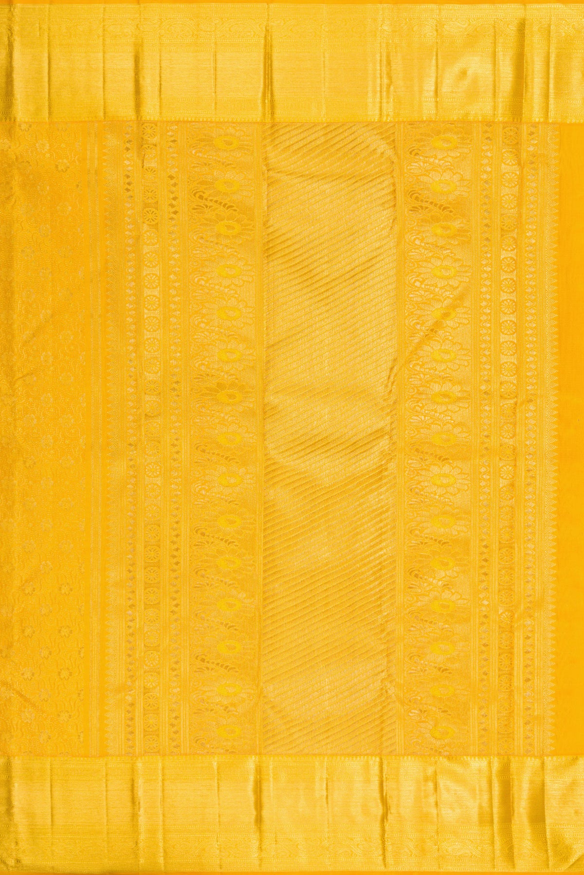 Close up image of the pallu of Pure Silk Mustard Kanchipuram Saree with Zari Brocade on the body and Zari Border. 
