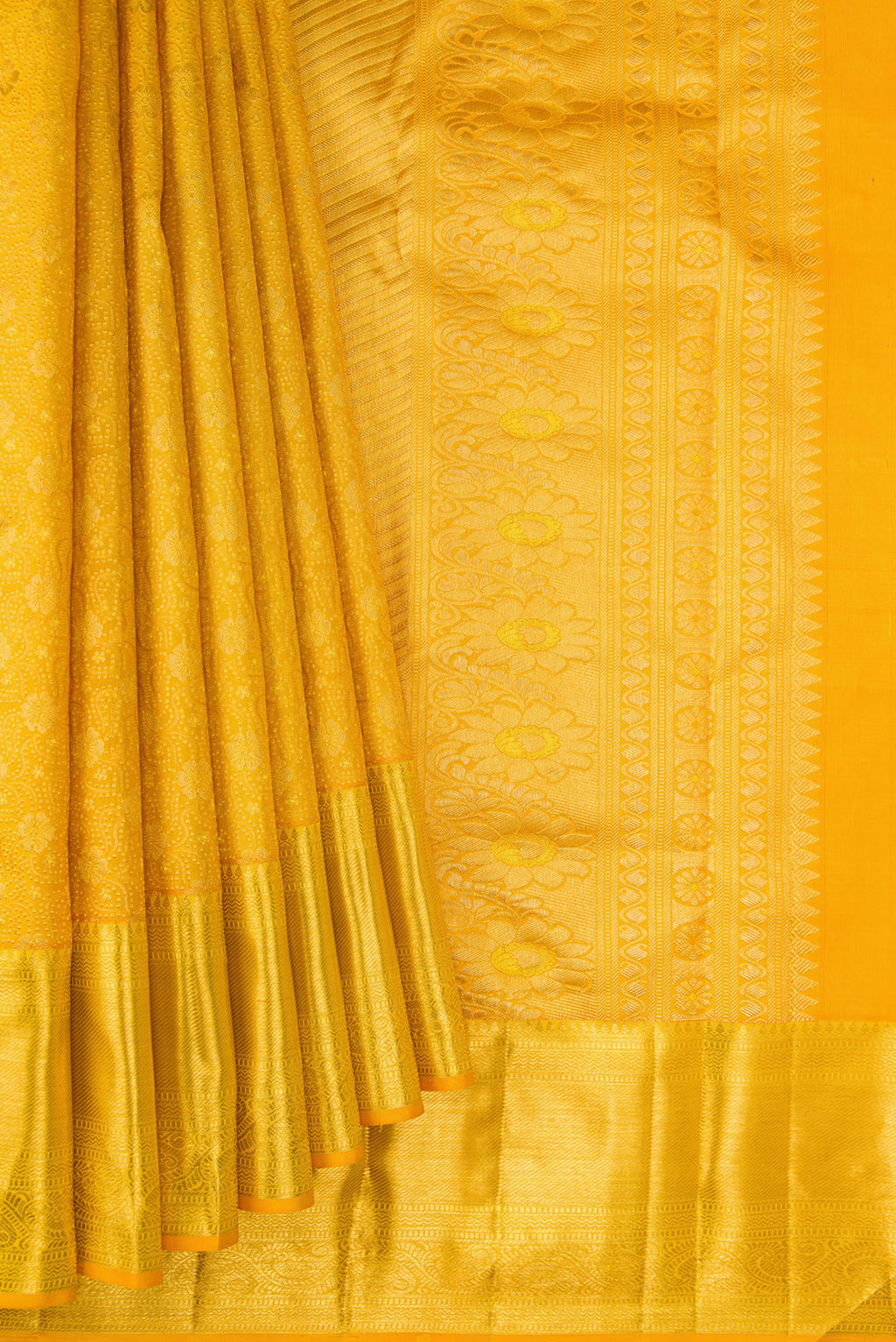 Pleats and pallu of Pure Silk Mustard Kanchipuram Saree with Zari Brocade on the body and Zari Border. 
