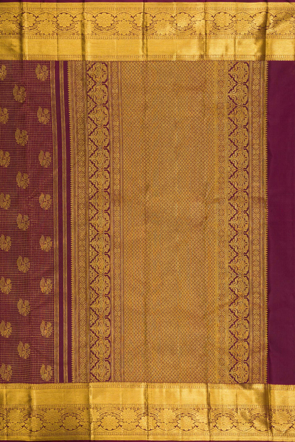 Close up image of the pallu of Pure Silk Brown Kanchipuram Saree with Zari Brocade on the body and Zari Border. 
