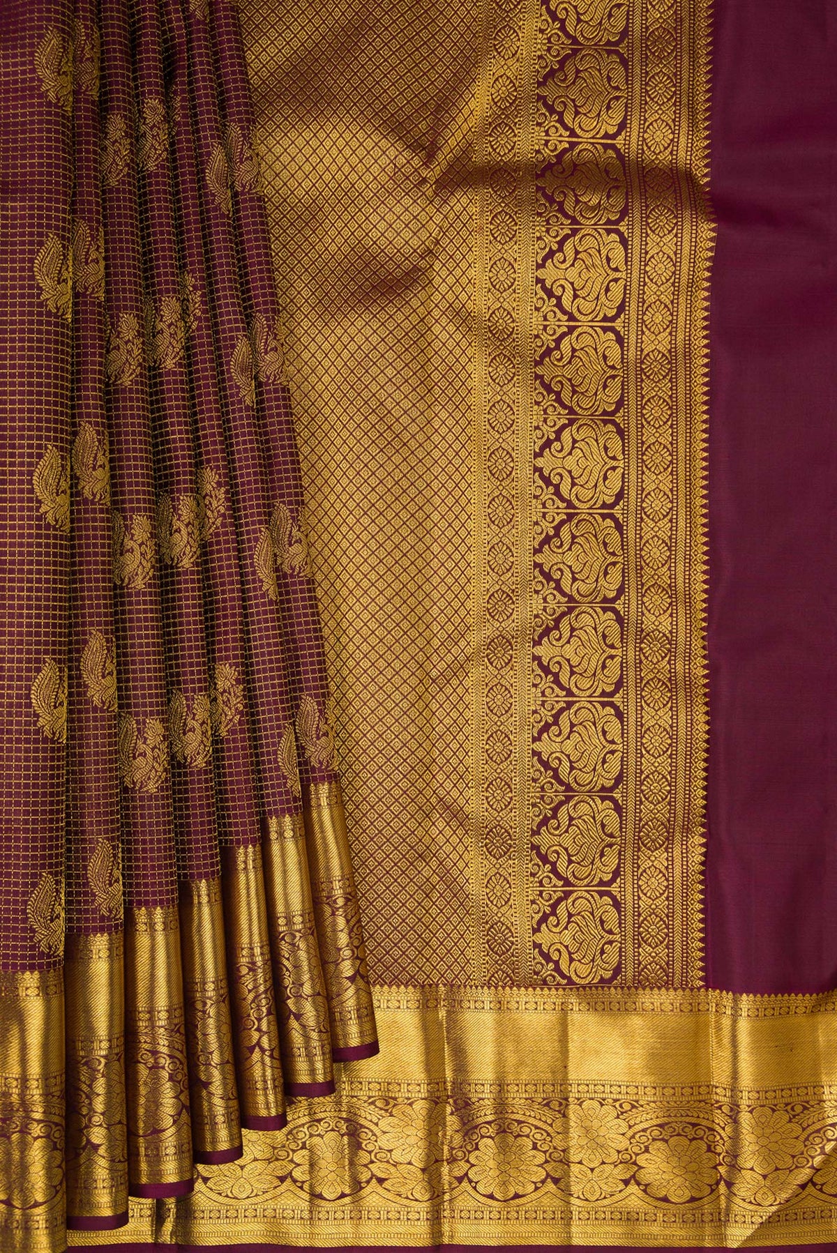 Pleats and pallu of Pure Silk Brown Kanchipuram Saree with Zari Brocade on the body and Zari Border. 