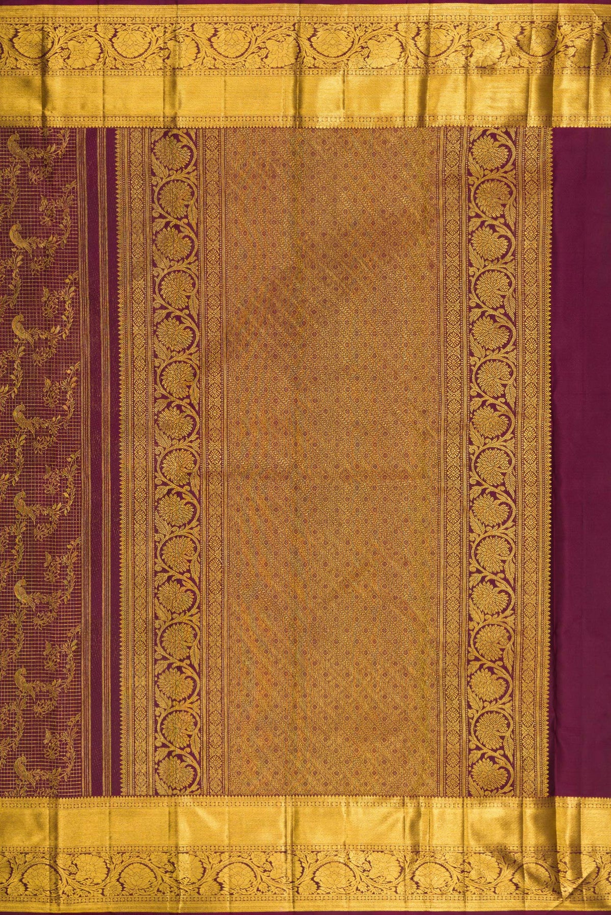 Close up image of the pallu of Pure Silk Maroon Kanchipuram Saree with Zari Brocade on the body and Zari Border. 