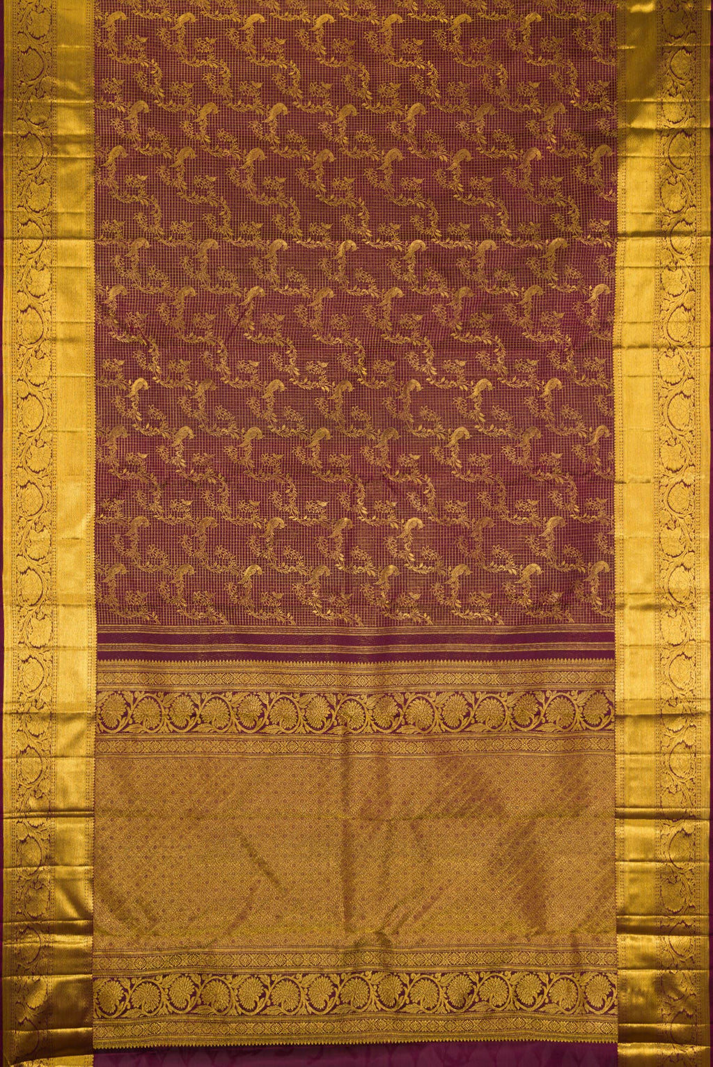 Flat view of Pure Silk Maroon Kanchipuram Saree with Zari Brocade on the body and Zari Border. 