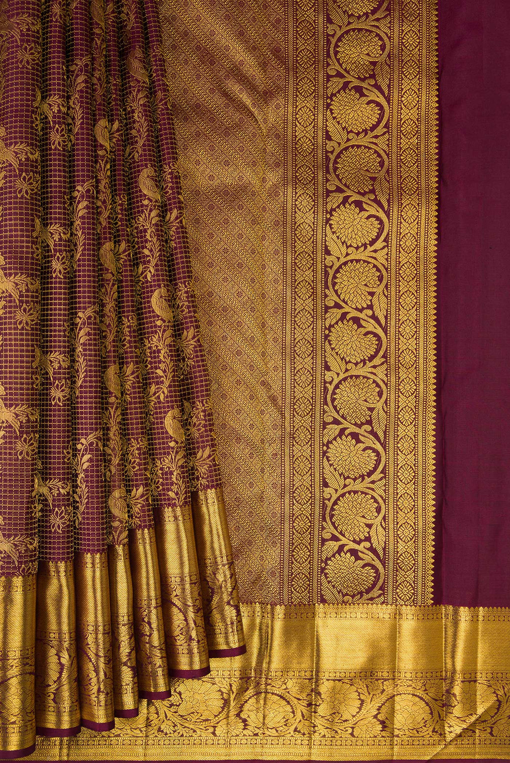 Pleats and pallu of Pure Silk Maroon Kanchipuram Saree with Zari Brocade on the body and Zari Border. 