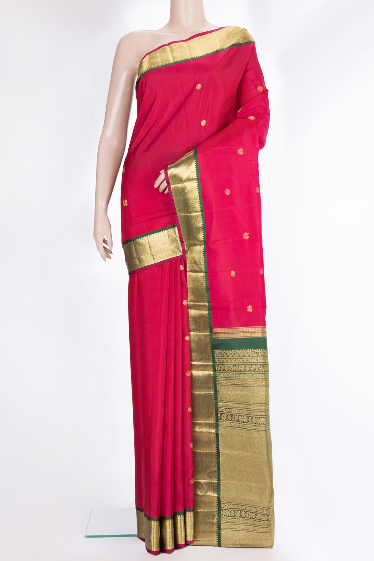 Pure Silk Pink Dual Tone Kanjivaram Saree with Zari Butta on the body and Zari Border.  displayed on a mannequin