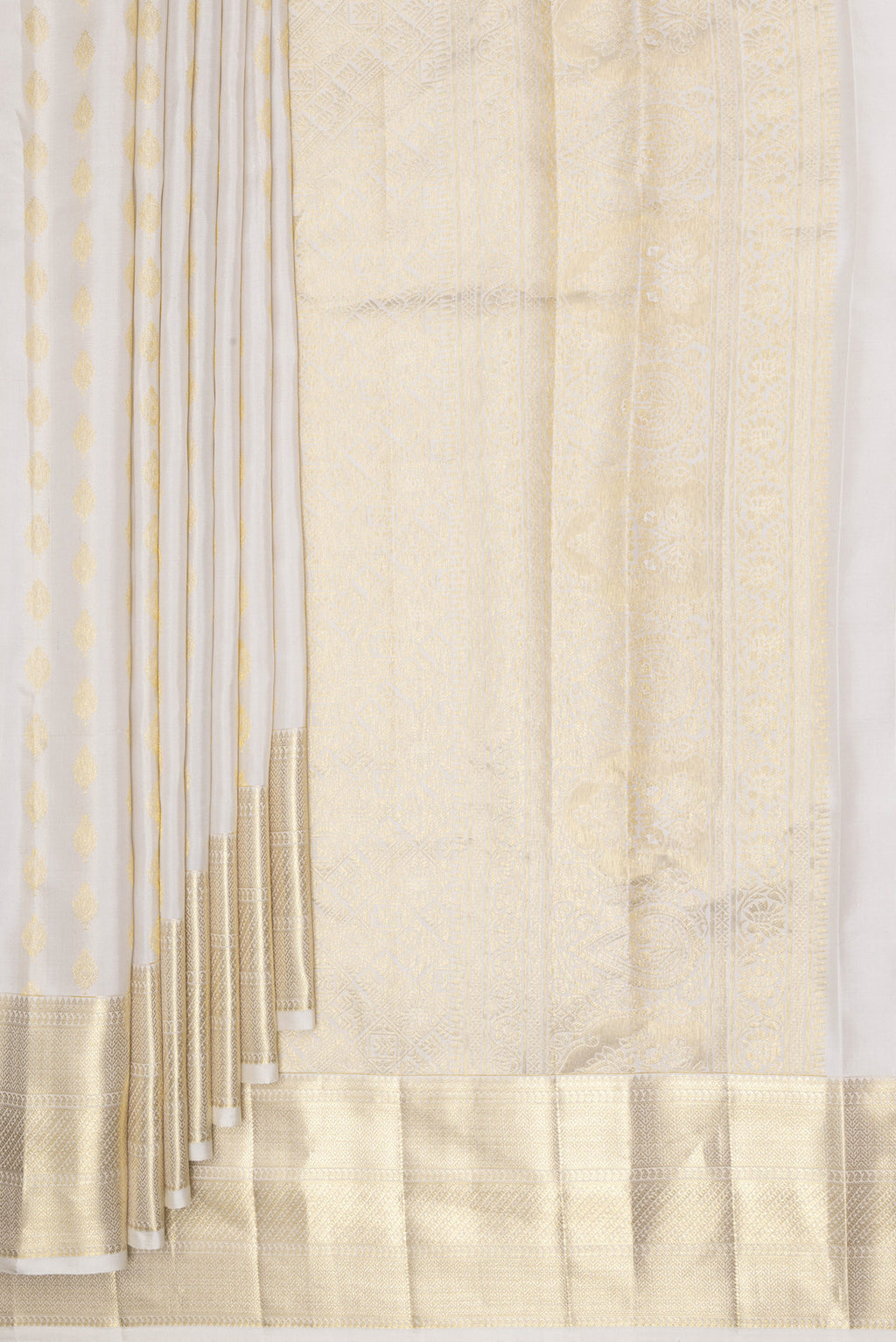 Pleats and pallu of Pure Silk White Kanchipuram Saree with Zari Butta on the body and Zari Border. 