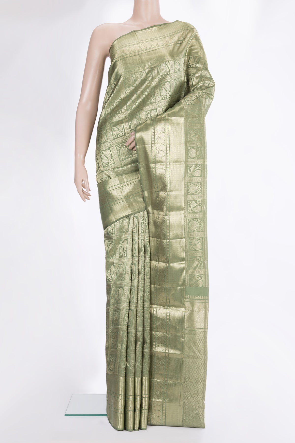 Pure Silk Mehandi Green Dual Tone Kanchipuram Saree with Zari Brocade on the body and Zari Border.  displayed on a mannequin