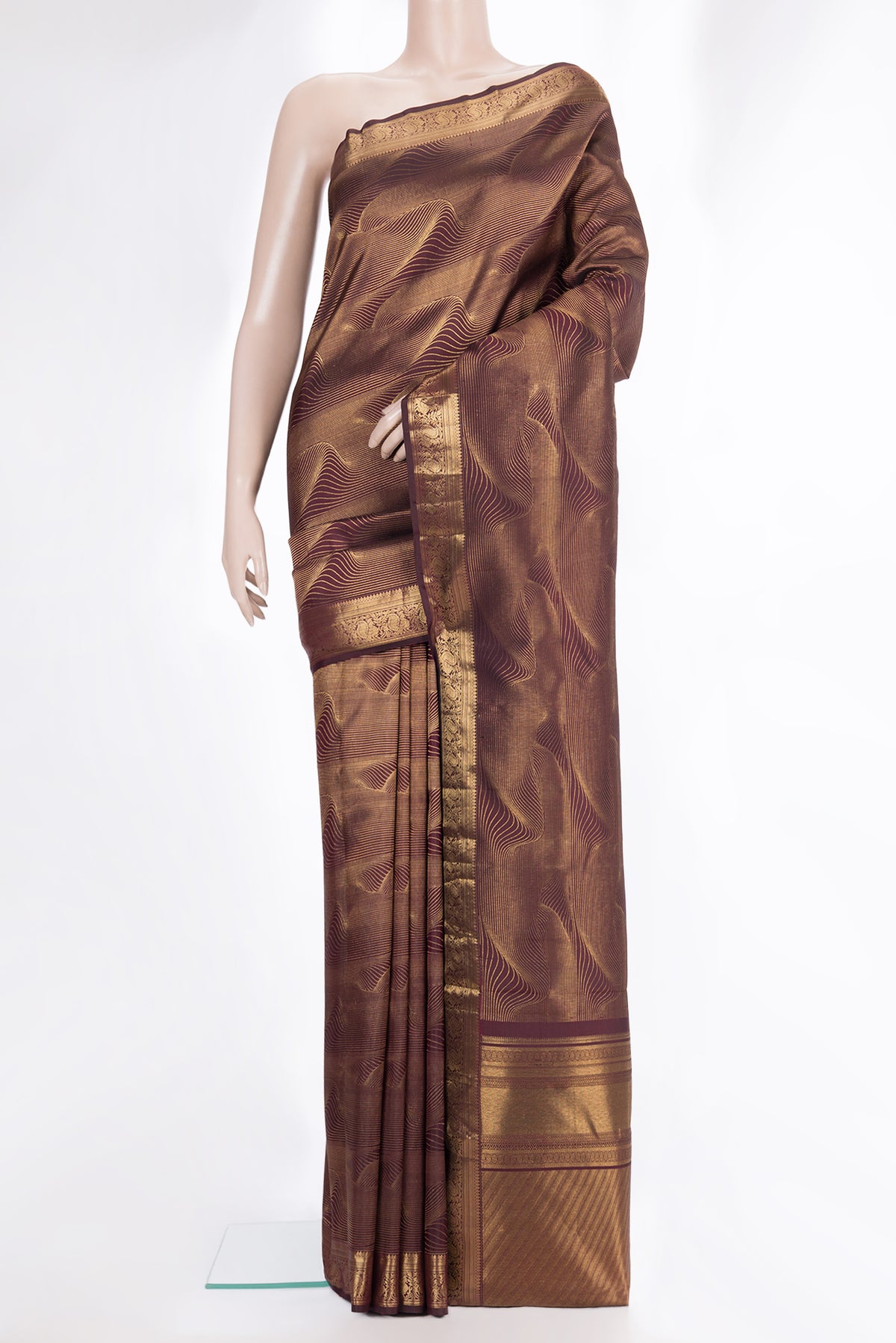Pure Silk Coffee Brown Kanchipuram Saree with Zari Brocade on the body and Fancy Border.  displayed on a mannequin