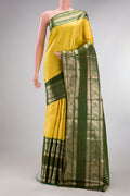 Pure Silk Lemon Yellow Kanchipuram Saree with Zari Brocade on the body and Fancy Border.  displayed on a mannequin