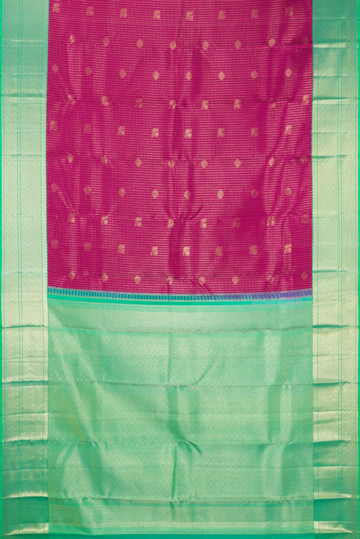 Flat view of Pure Silk Dark Pink Kanjivaram Saree with Zari Brocade on the body and Zari Border. 