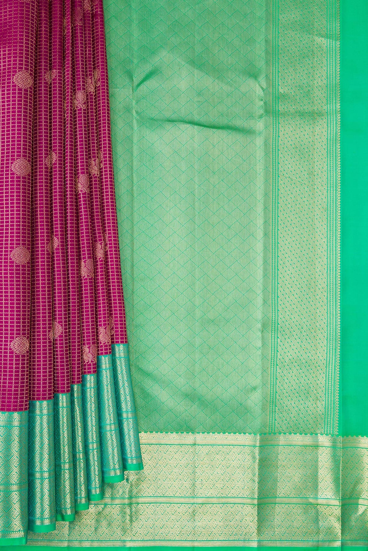 Pleats and pallu of Pure Silk Dark Pink Kanjivaram Saree with Zari Brocade on the body and Zari Border. 