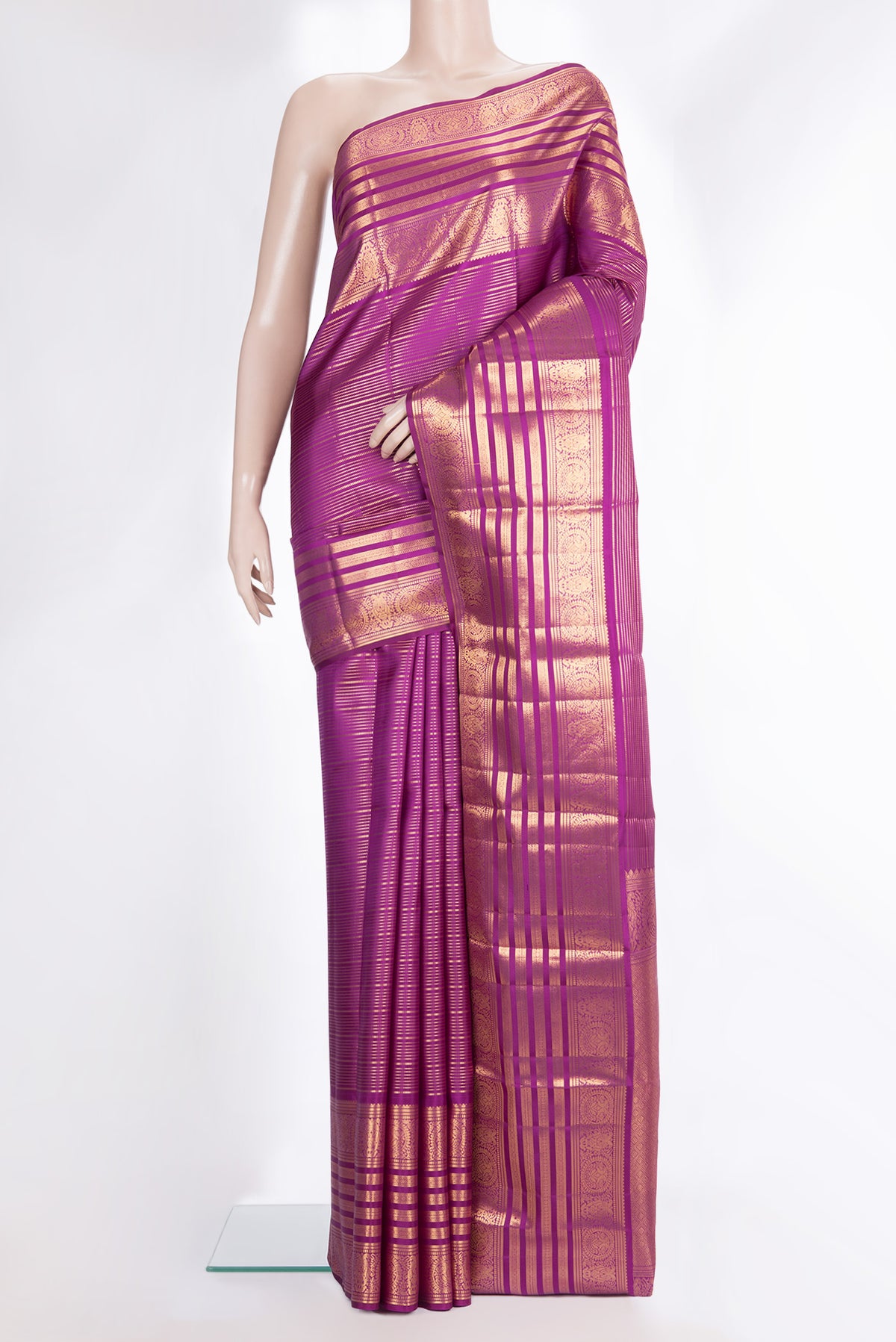 Pure Silk Magenta Kanjivaram Saree with Zari Brocade on the body and Fancy Border.  displayed on a mannequin