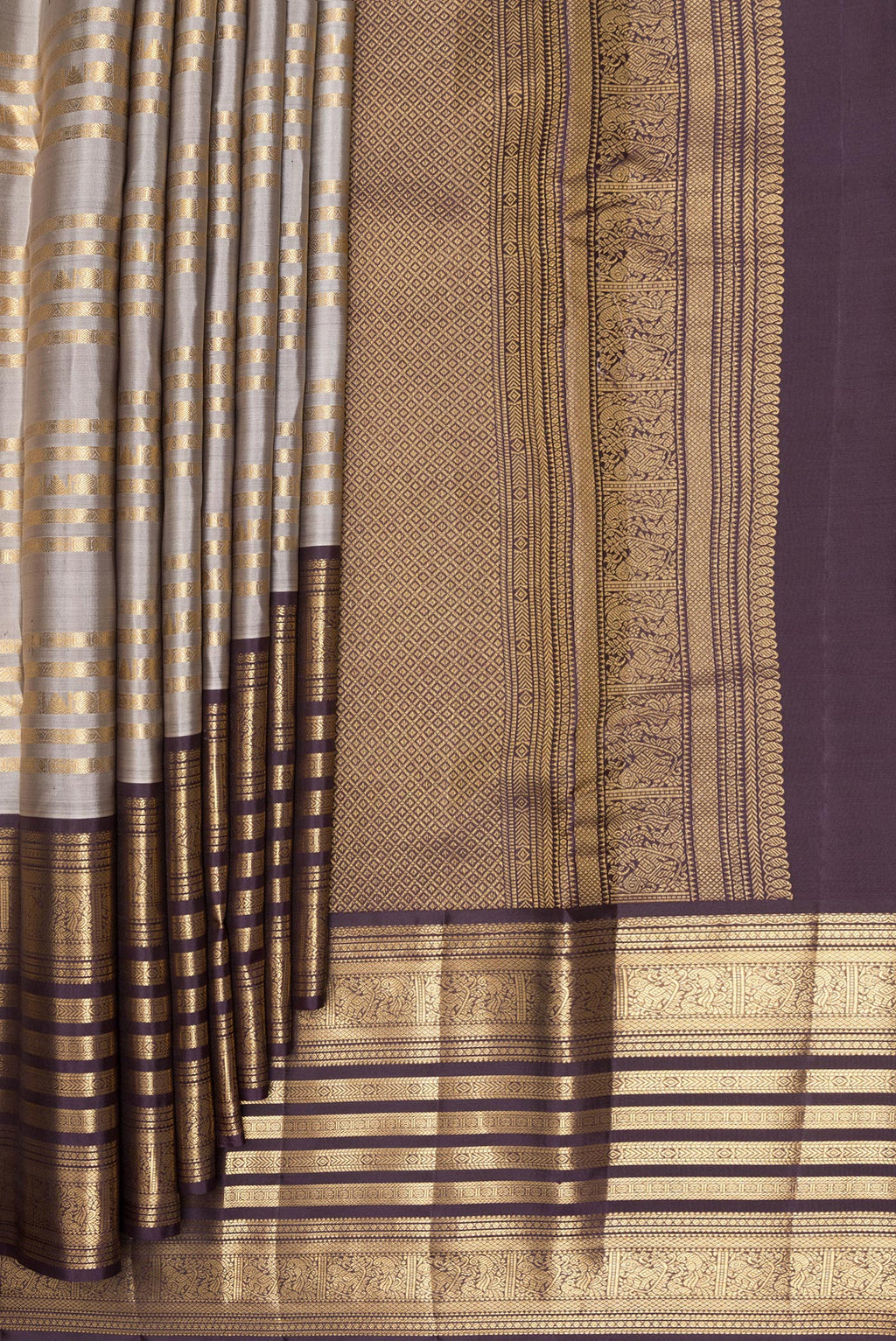 Pleats and pallu of Pure Silk Grey Kanjivaram Saree with Stripes on the body and Fancy Border. 