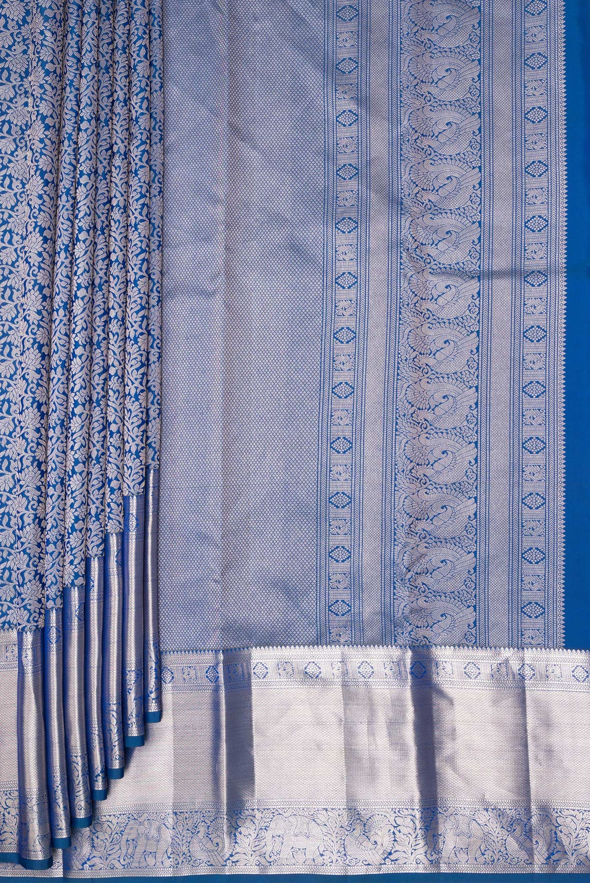 Pleats and pallu of Pure Silk Peacock Blue Dual Tone Kanchipuram Saree with Zari Brocade on the body and Zari Border. 