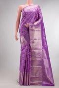 Pure Silk Lavender Kanchipuram Saree with Zari Brocade on the body and Zari Border.  displayed on a mannequin