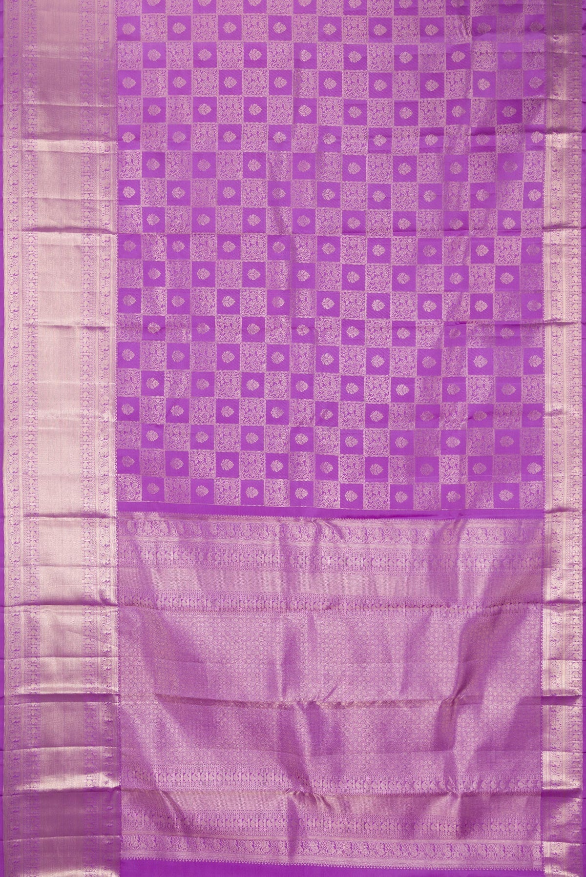 Flat view of Pure Silk Lavender Kanchipuram Saree with Zari Brocade on the body and Zari Border. 