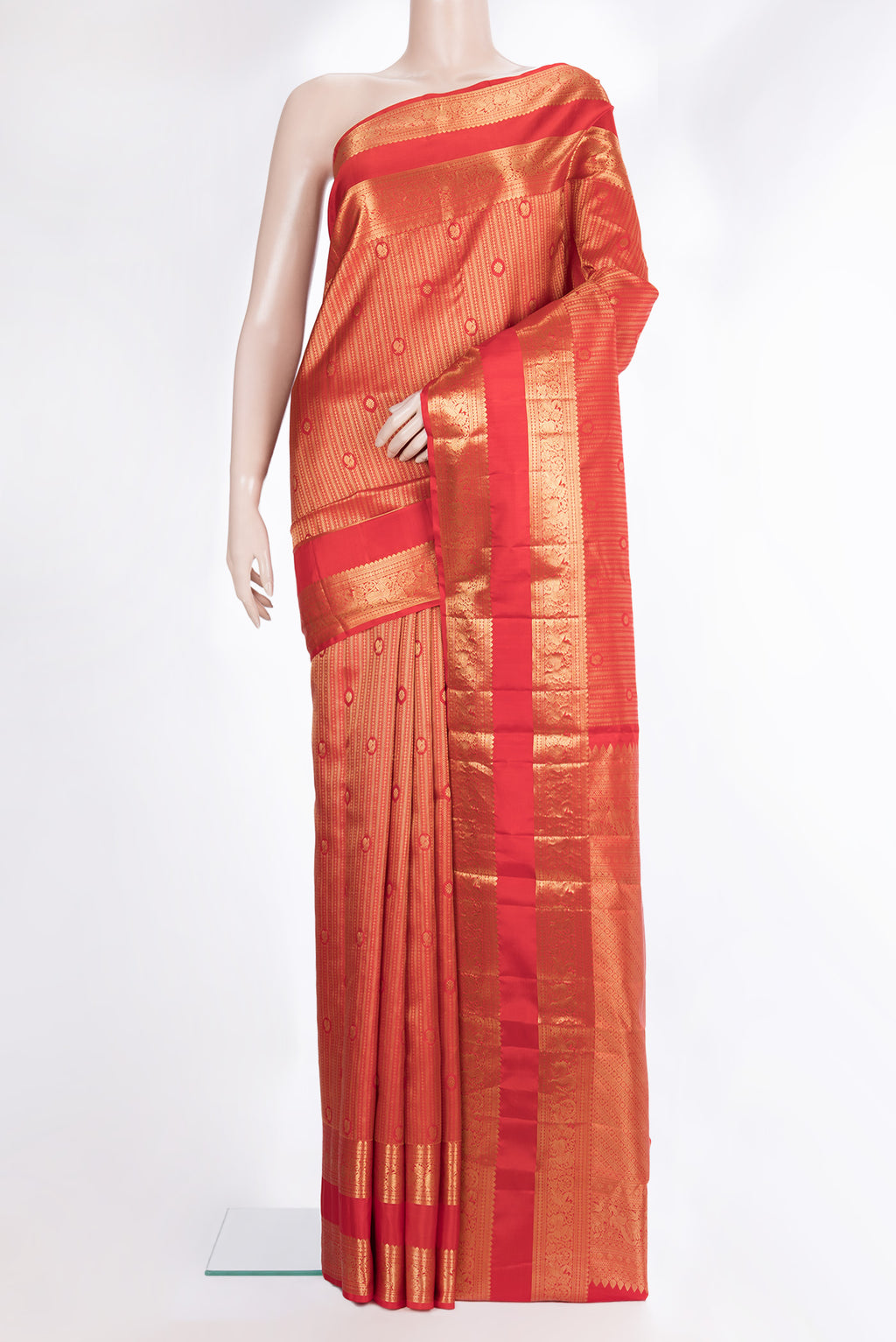 Pure Silk Red Kanjivaram Saree with Zari Brocade on the body and Zari Border.  displayed on a mannequin