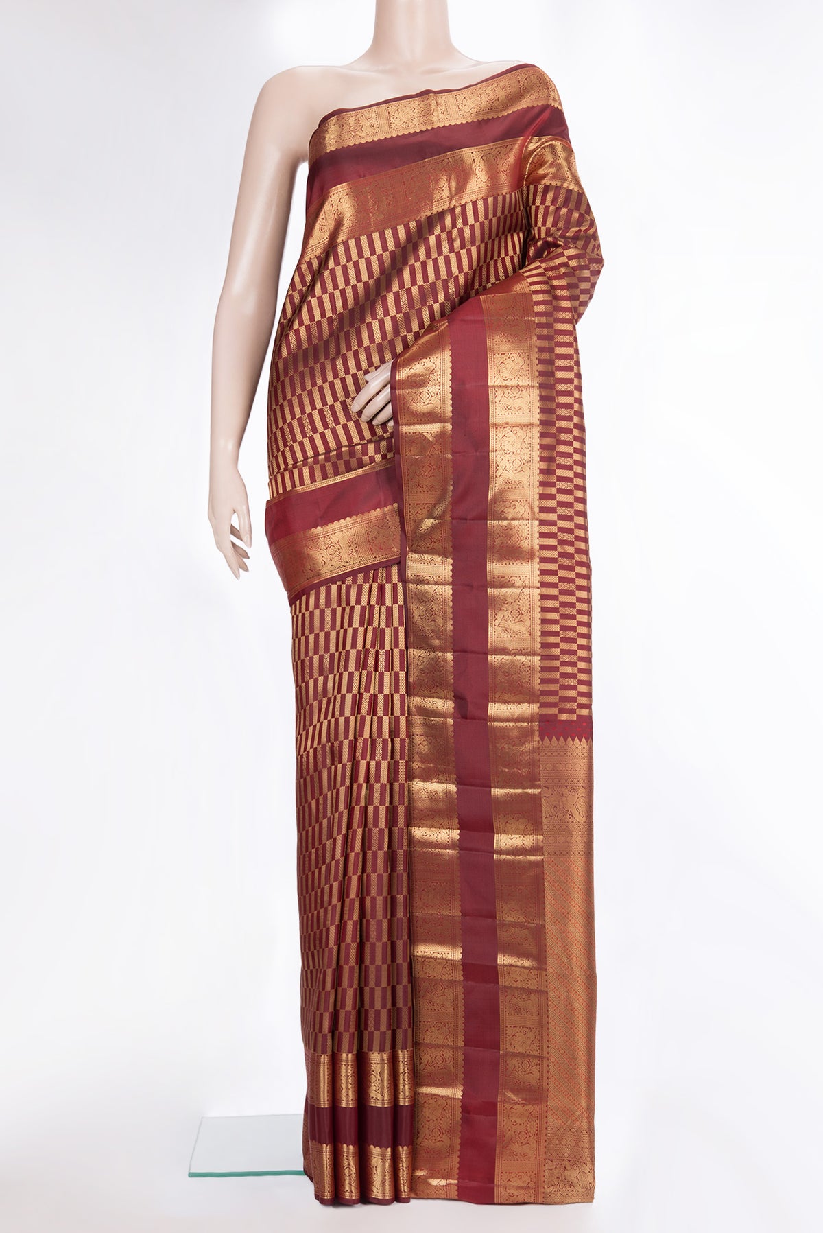 Pure Silk Maroon Kanjivaram Saree with Zari Brocade on the body and Zari Border.  displayed on a mannequin
