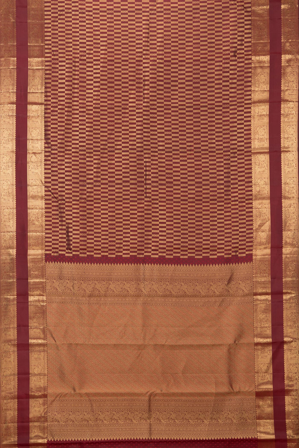 Flat view of Pure Silk Maroon Kanjivaram Saree with Zari Brocade on the body and Zari Border. 