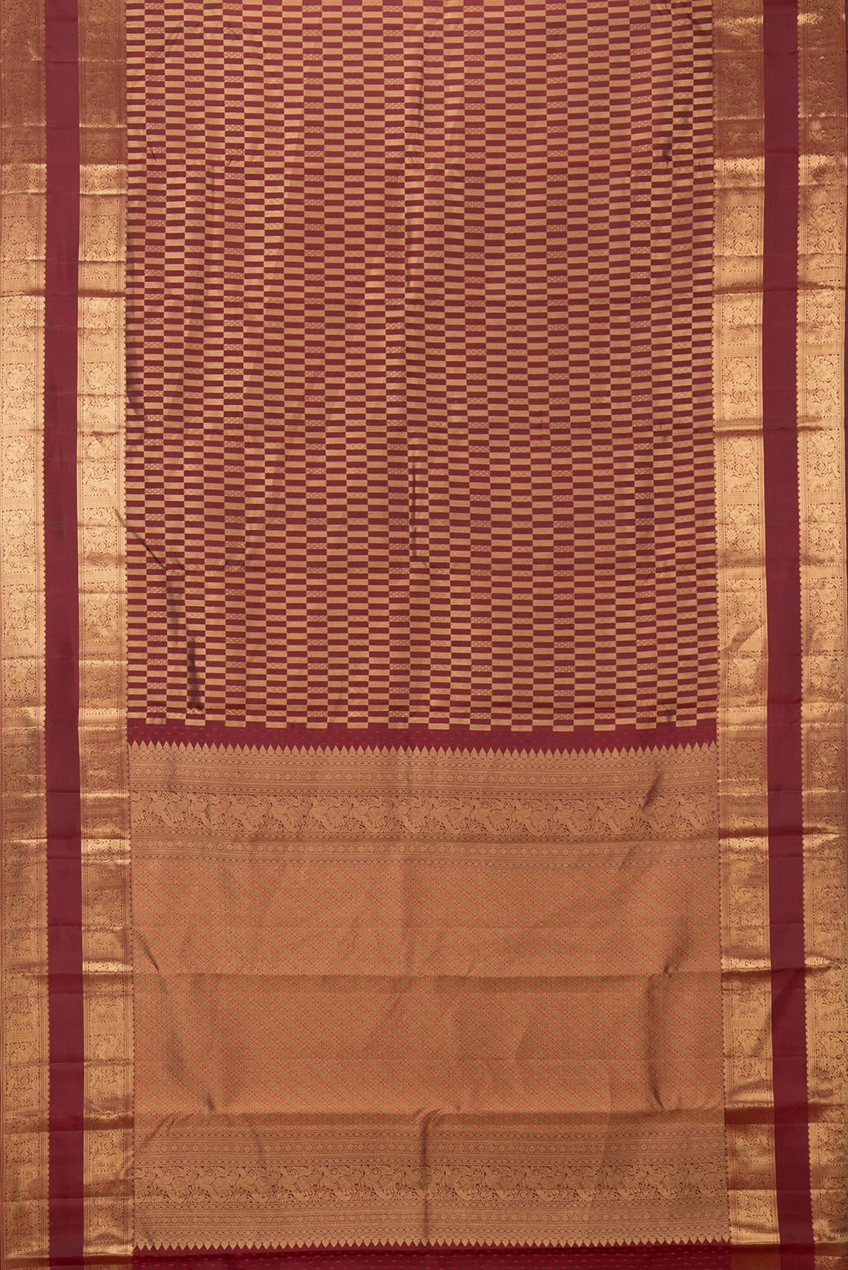 Flat view of Pure Silk Maroon Kanjivaram Saree with Zari Brocade on the body and Zari Border. 